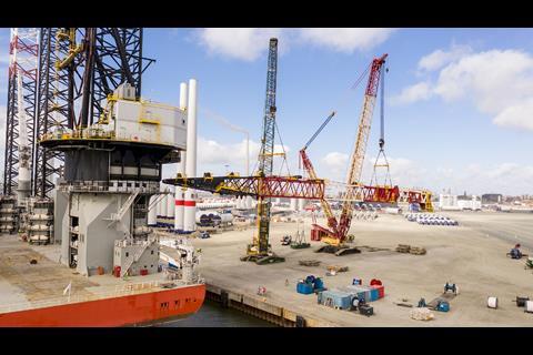 New extended crane boom being installed on Swire Blue Ocean's Pacific Osprey